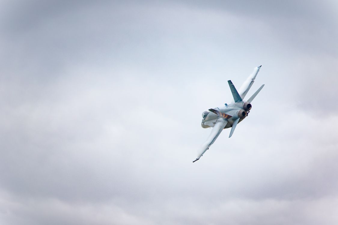 Dynamic Jet Fighter Performing Aerial Maneuver · Free Stock Photo
