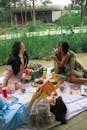 Trendy Picnic Gathering in Lush Garden Setting