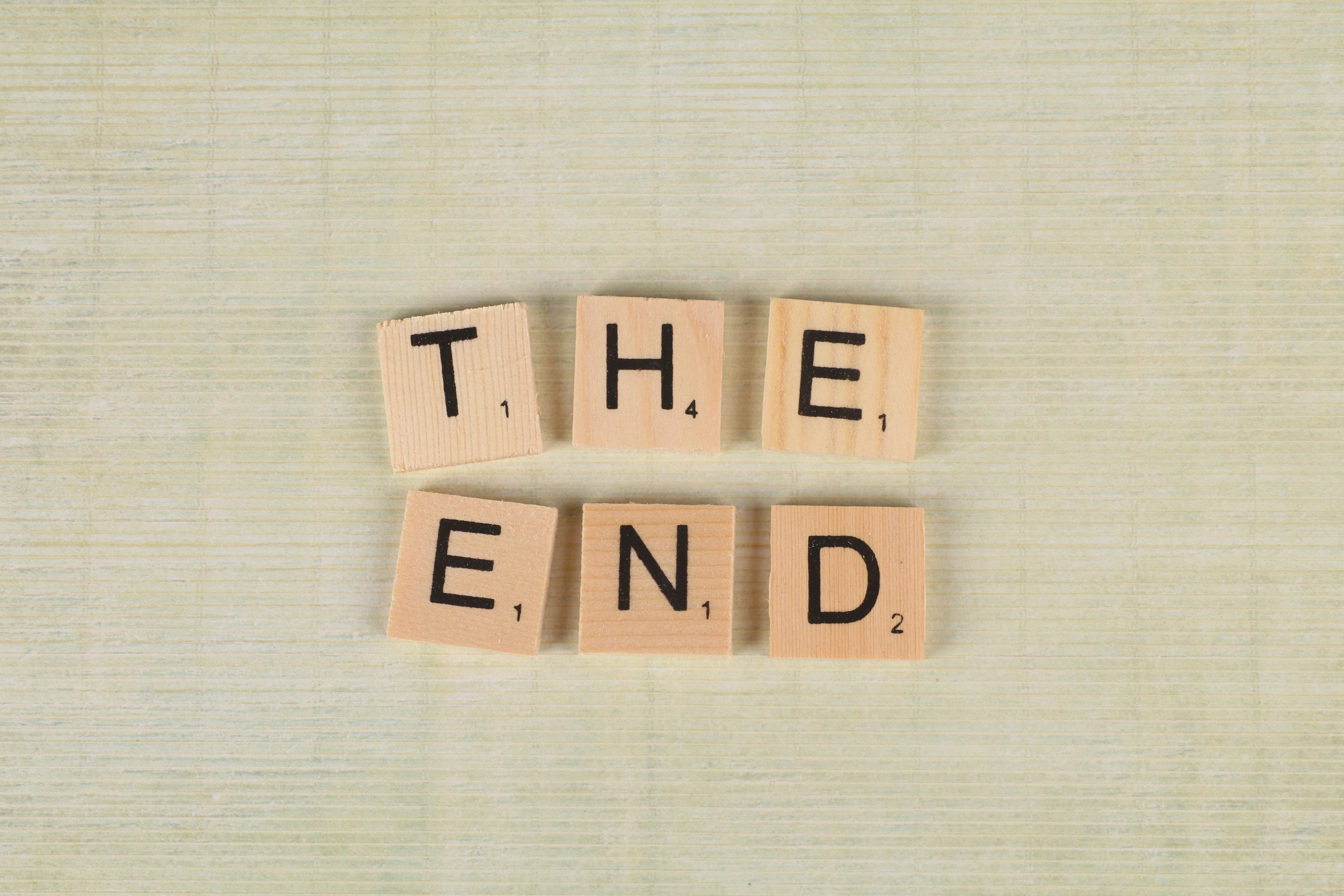 CloseUp Of Scrabble Tiles Forming The Words "The End" · Free Stock Photo