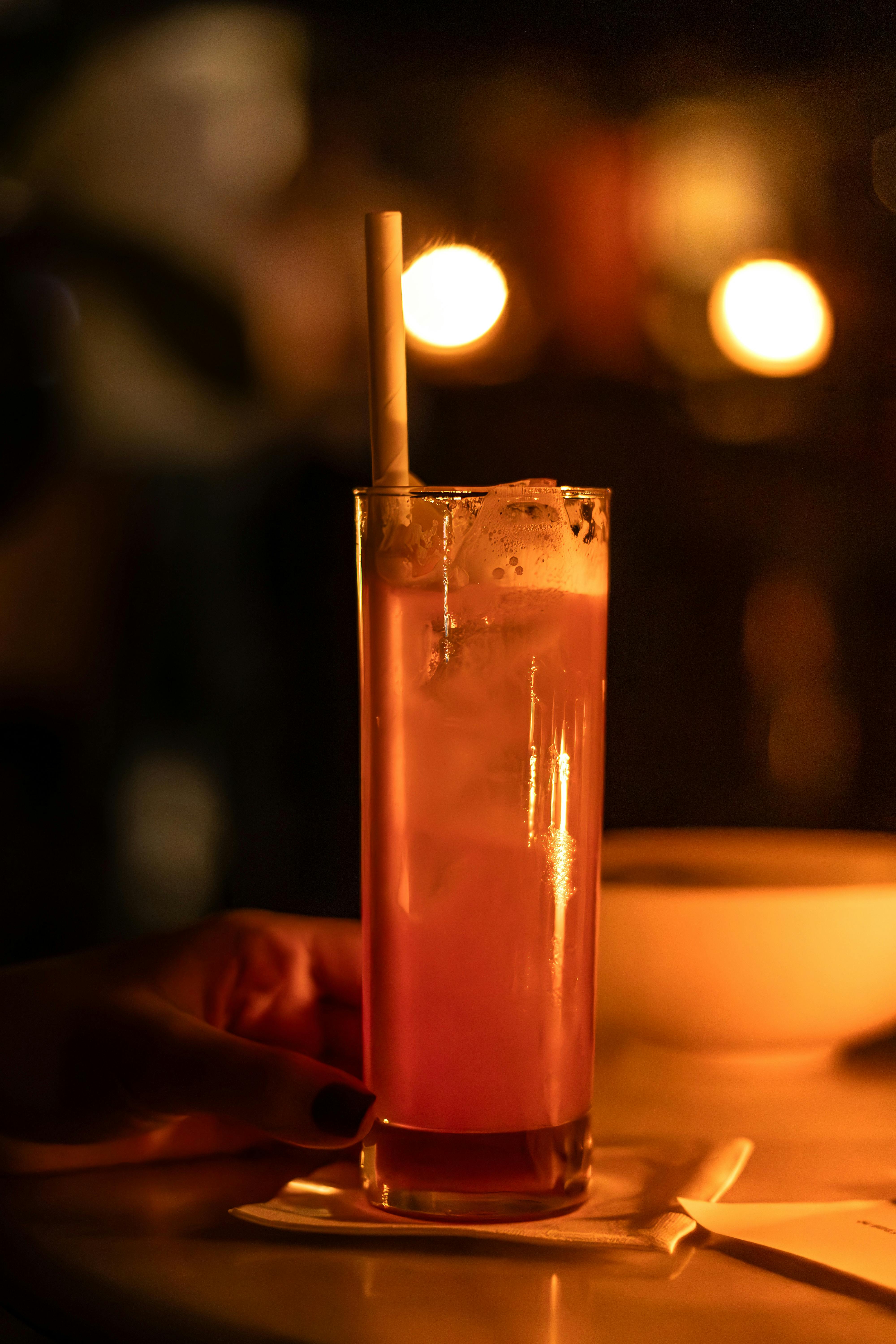 vibrant cocktail in dimly lit ambiance