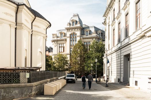 Elegant architecture and a quiet street in Bucharest, Romania's capital.