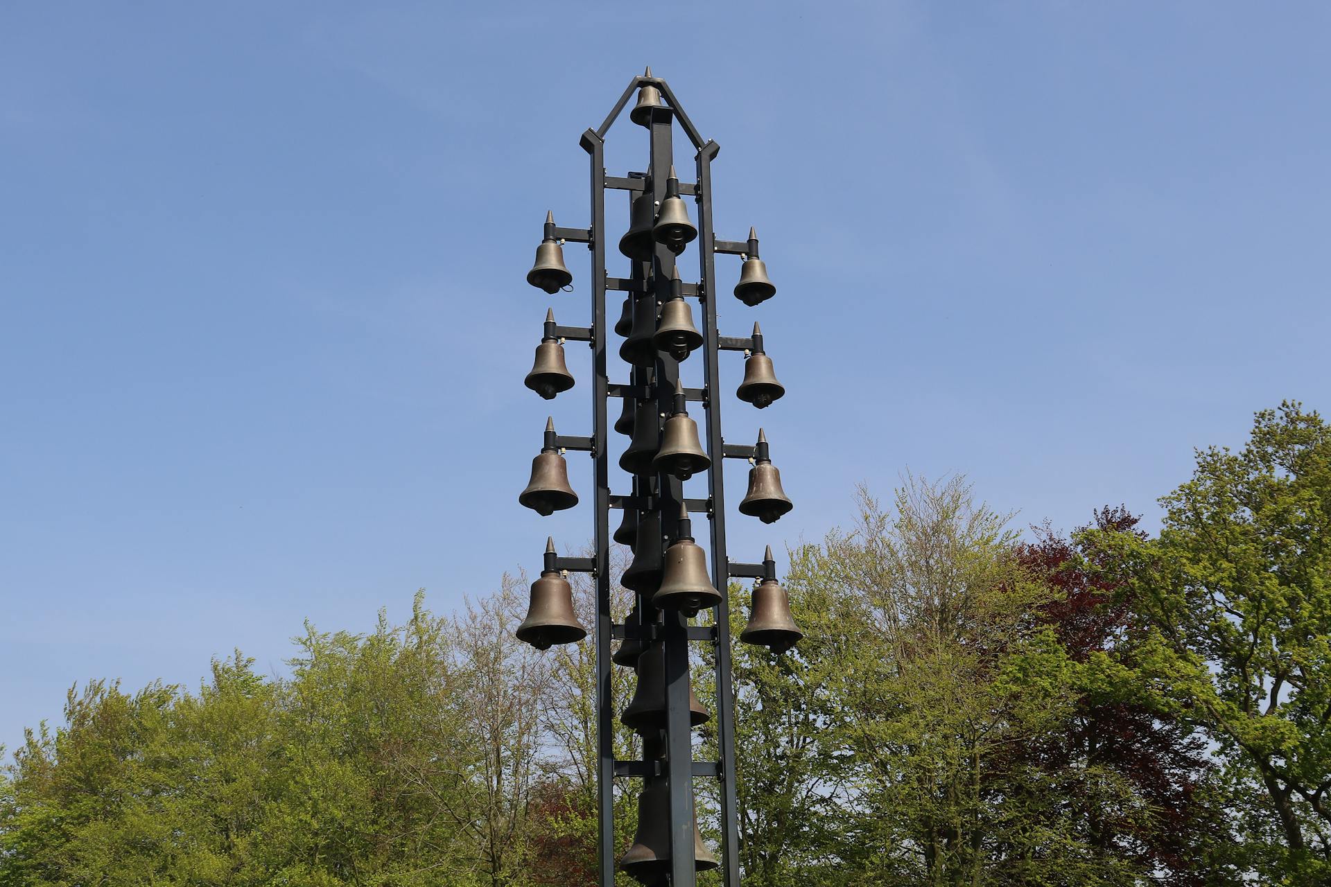 A metal structure with metal bells