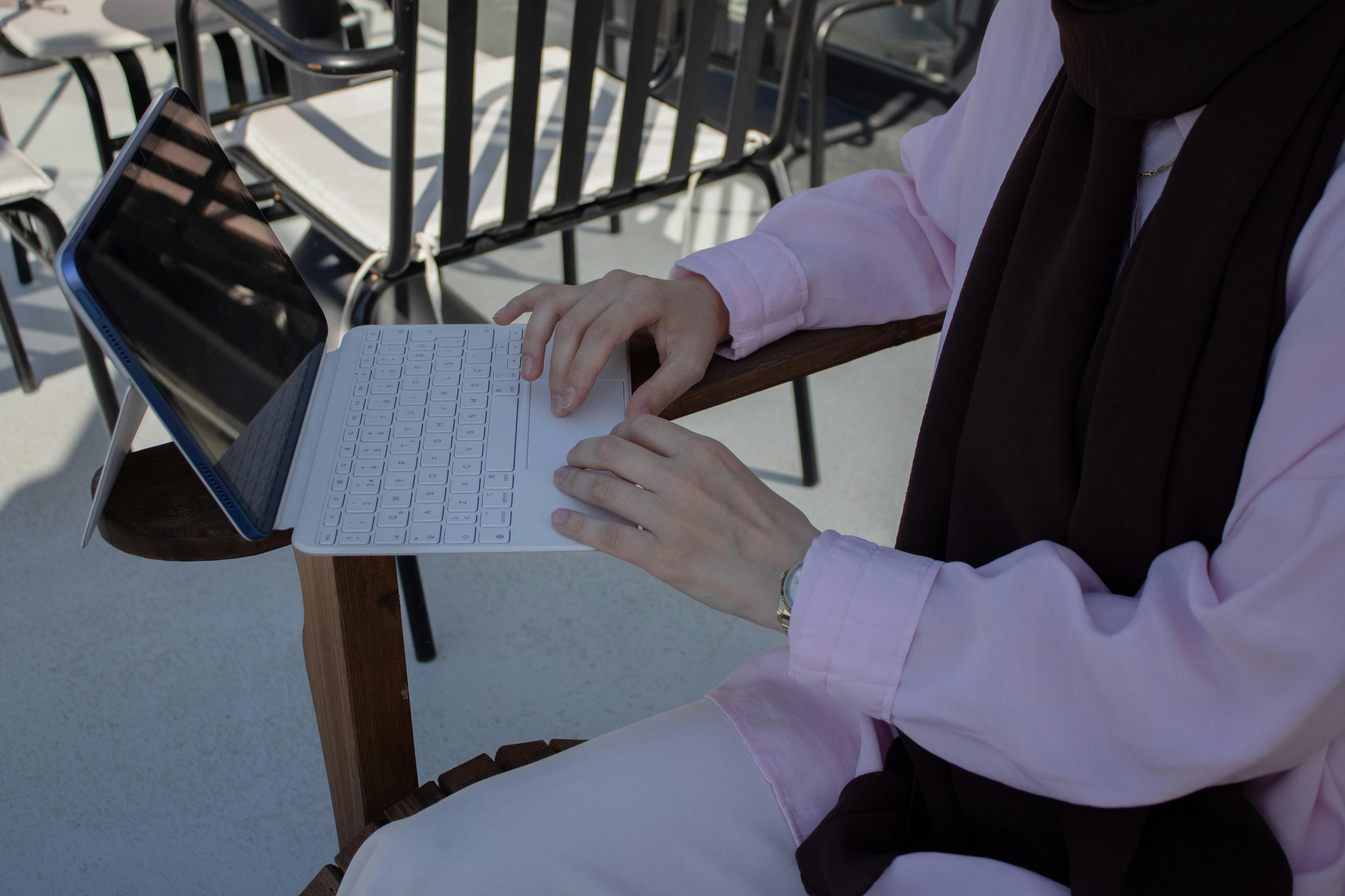A student works on a laptop outdoors in Istanbul, September 25, 2024. (Photo via Pexels)