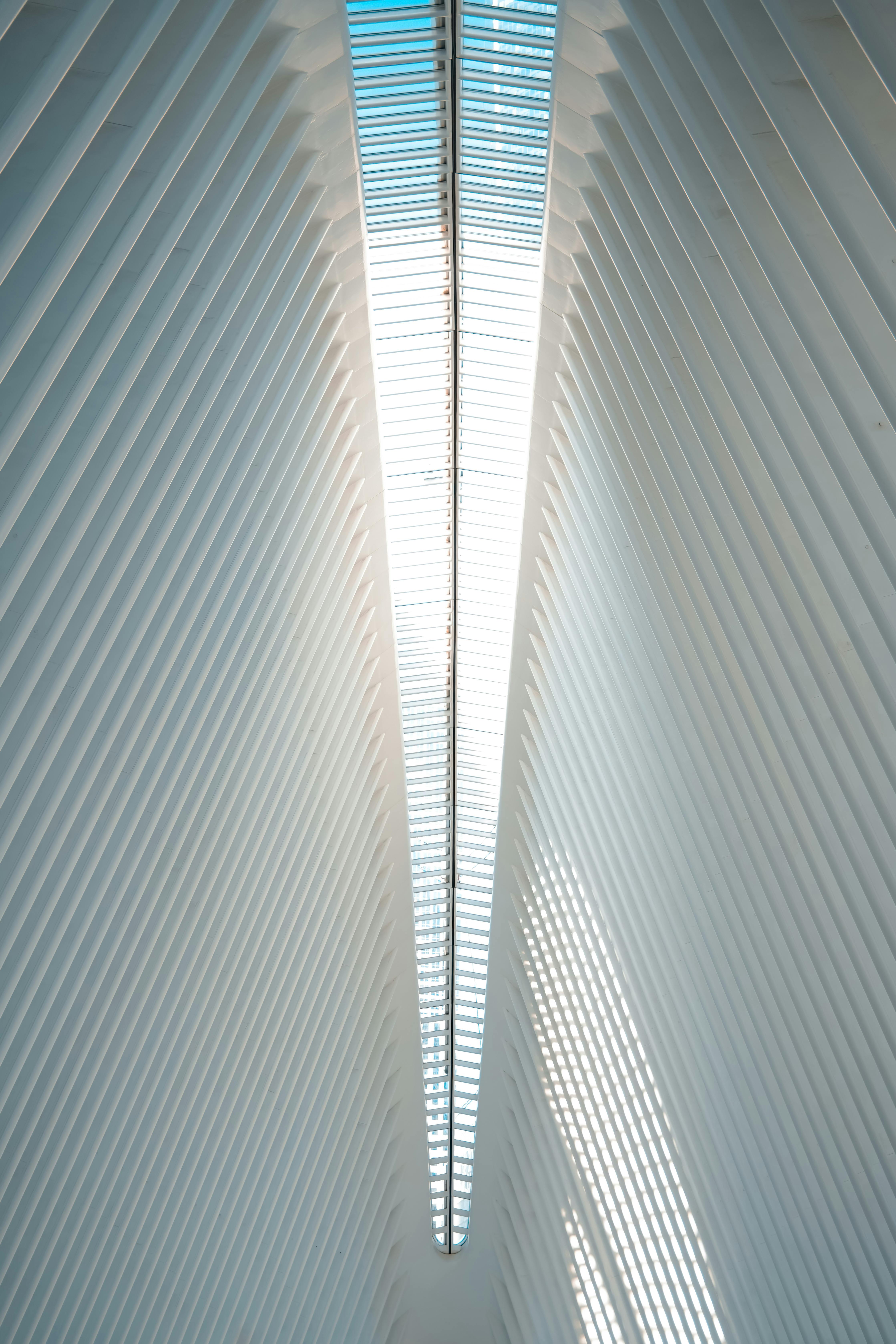 Abstract architectural view of The Oculus' interior in New York City, showcasing its modern design.