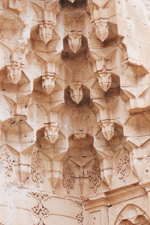 Free Close-up of ornate architectural stonework showcasing geometric patterns. Stock Photo