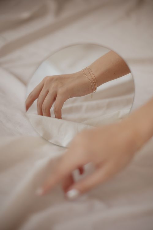 Artistic Reflection of a Hand in a Mirror · Free Stock Photo