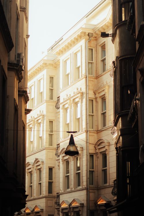 Free Charming view of classic Istanbul architecture on a quiet street, capturing rich history and elegant design. Stock Photo