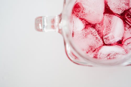 Free Clear Glass Mug With Ice and Red Liquid Stock Photo