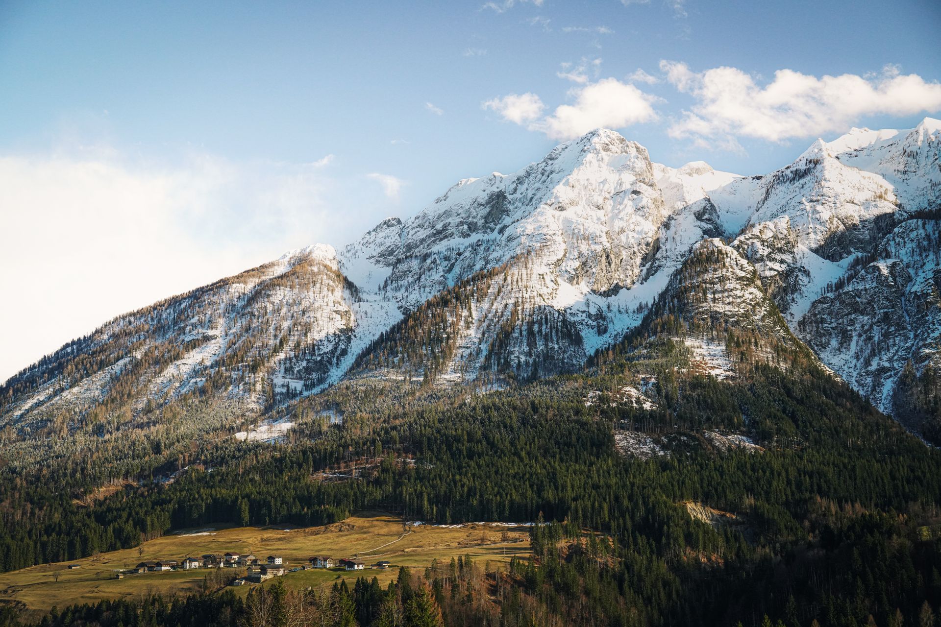 Snow-Capped Mountains in Serene Alpine Setting