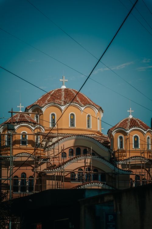 Free A stunning architectural shot of an Orthodox Church under a clear blue sky, showcasing elegant domes. Stock Photo