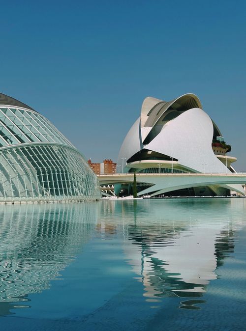 Free Modern architecture of City of Arts and Sciences in Valencia, reflected in calm water. Stock Photo
