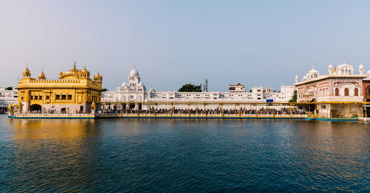 Traditional Punjabi farming village with mustard fields and rural architecture