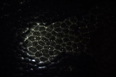 Intriguing abstract pattern of light and shadow on a dark background, — Photo by Nikhil Manan on Pexels