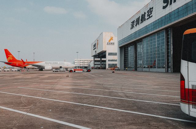 A Shenzhen Airlines plane parked on the tarmac at Shenzhen Airport. — arriving in Shenzhen
