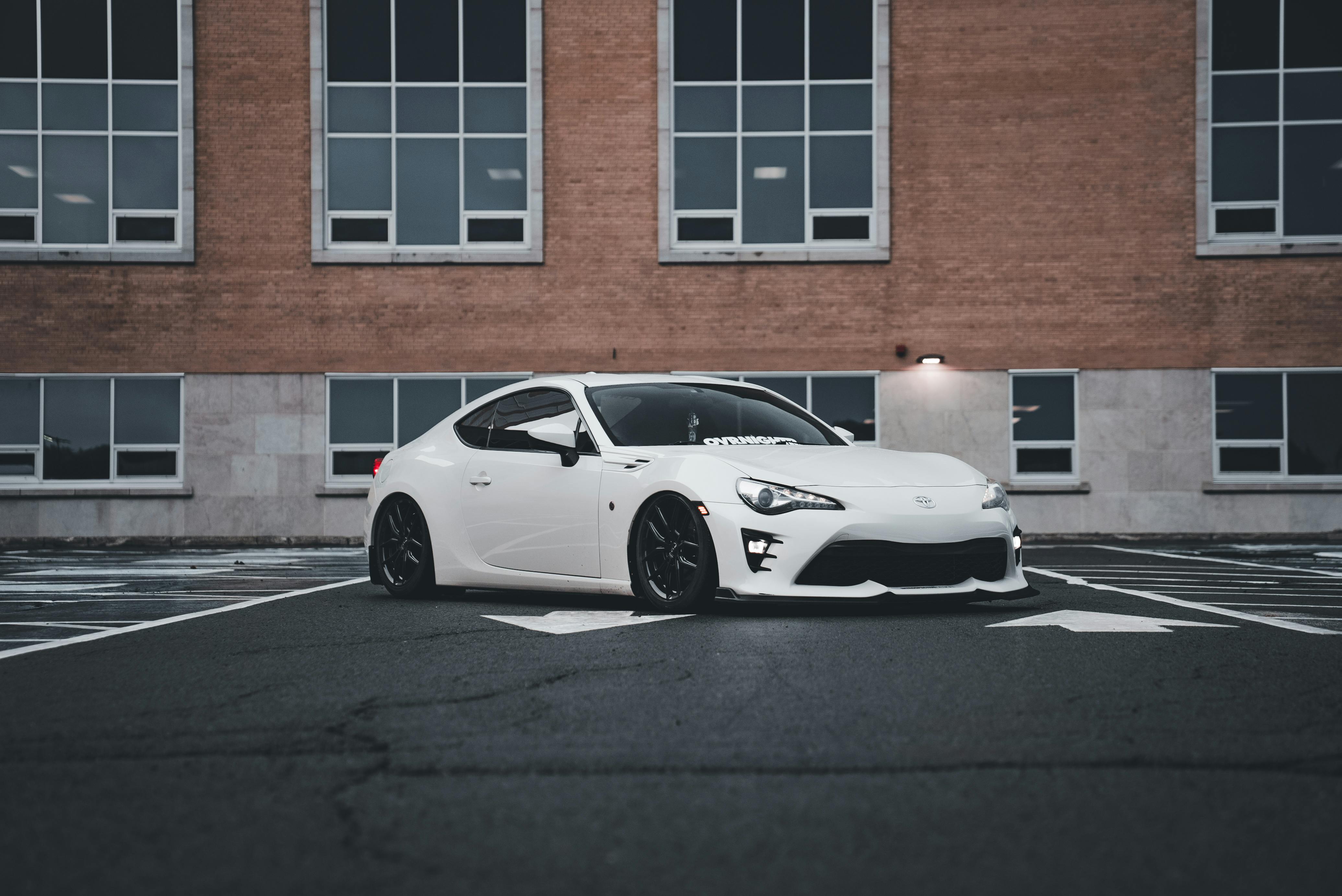 sleek white sports car on urban street