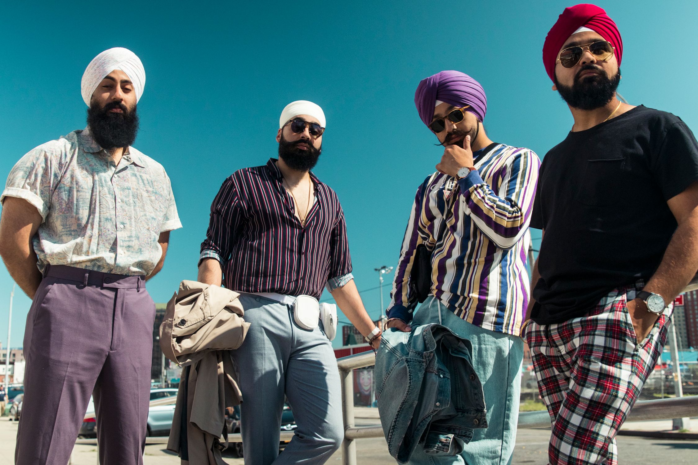 Group Of Four Men Standing Near Park Free Stock Photo group-of-four-men-standing-near-park-free-stock-photo