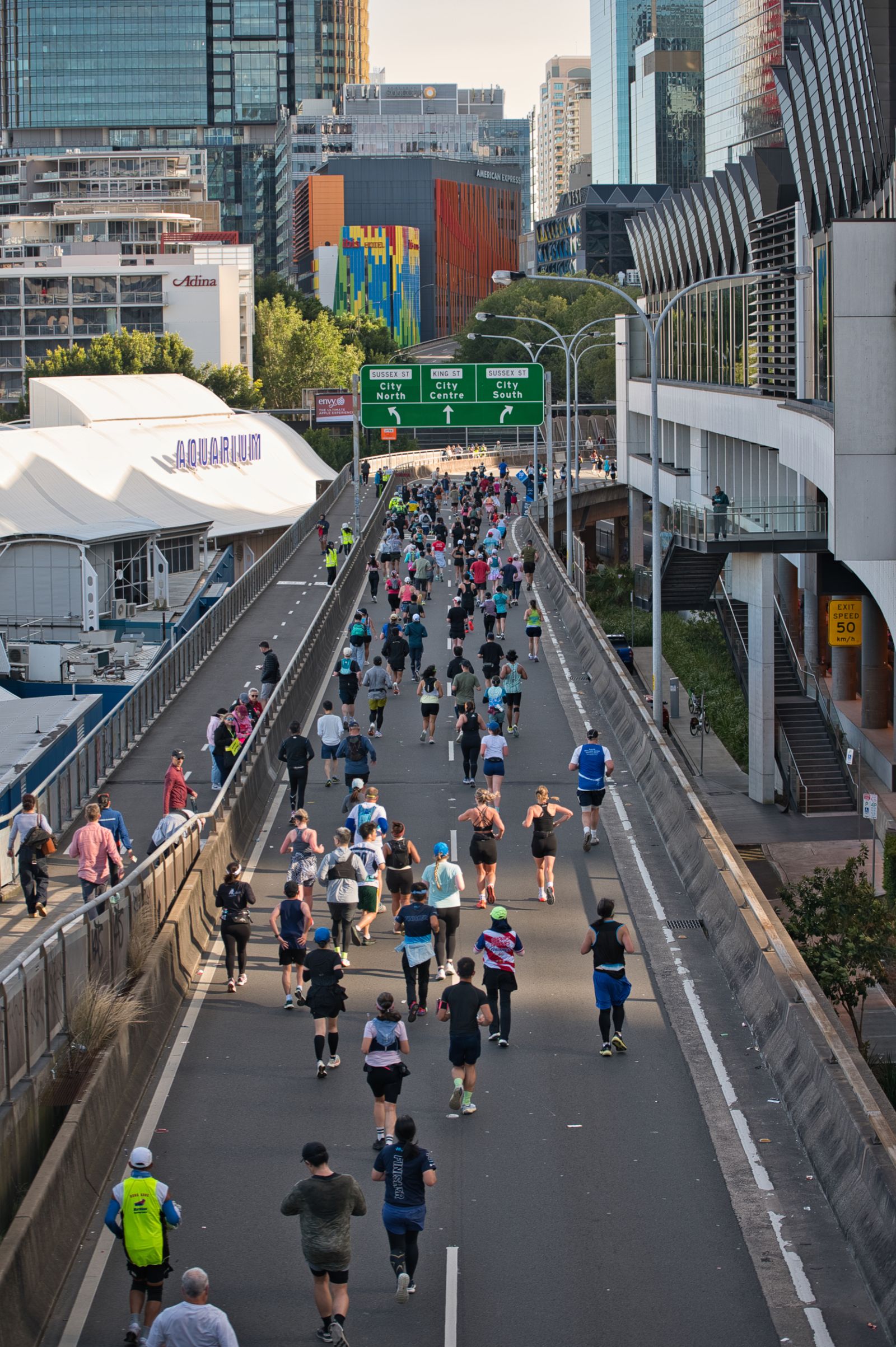 Marathon runners racing through a city