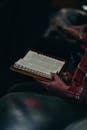 Person Holding Open Bible During Reading