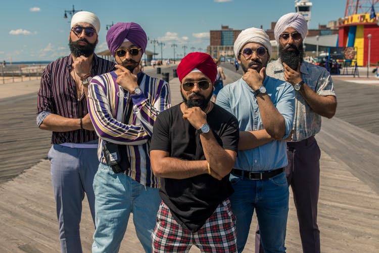 Indian Men In Turbans Posing With Their Hands On The Chin