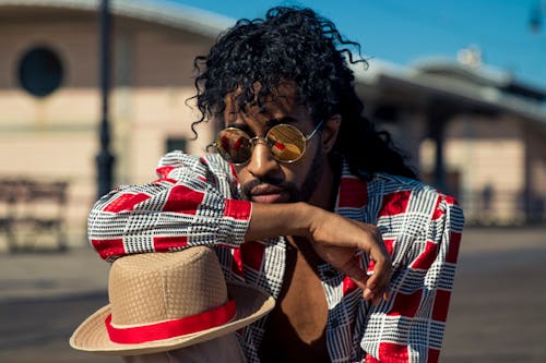 Close-Up Photo of Man Wearing Sunglasses