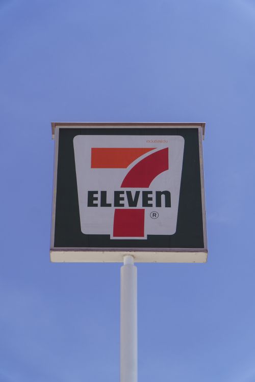 7 Eleven Sign Against Clear Blue Sky Free Stock Photo 7-eleven-sign-against-clear-blue-sky-free-stock-photo