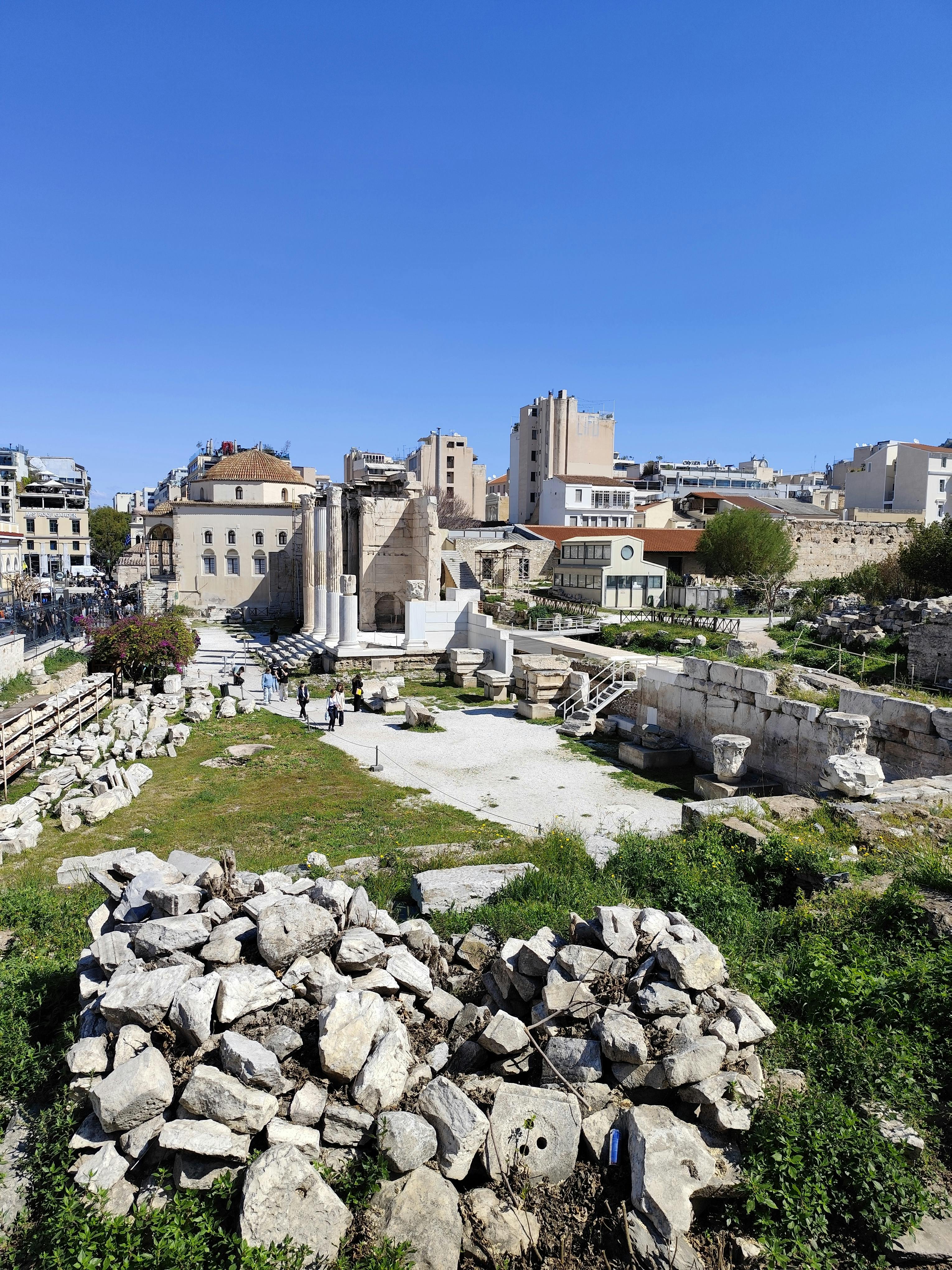 ancient roman ruins in a mediterranean cityscape