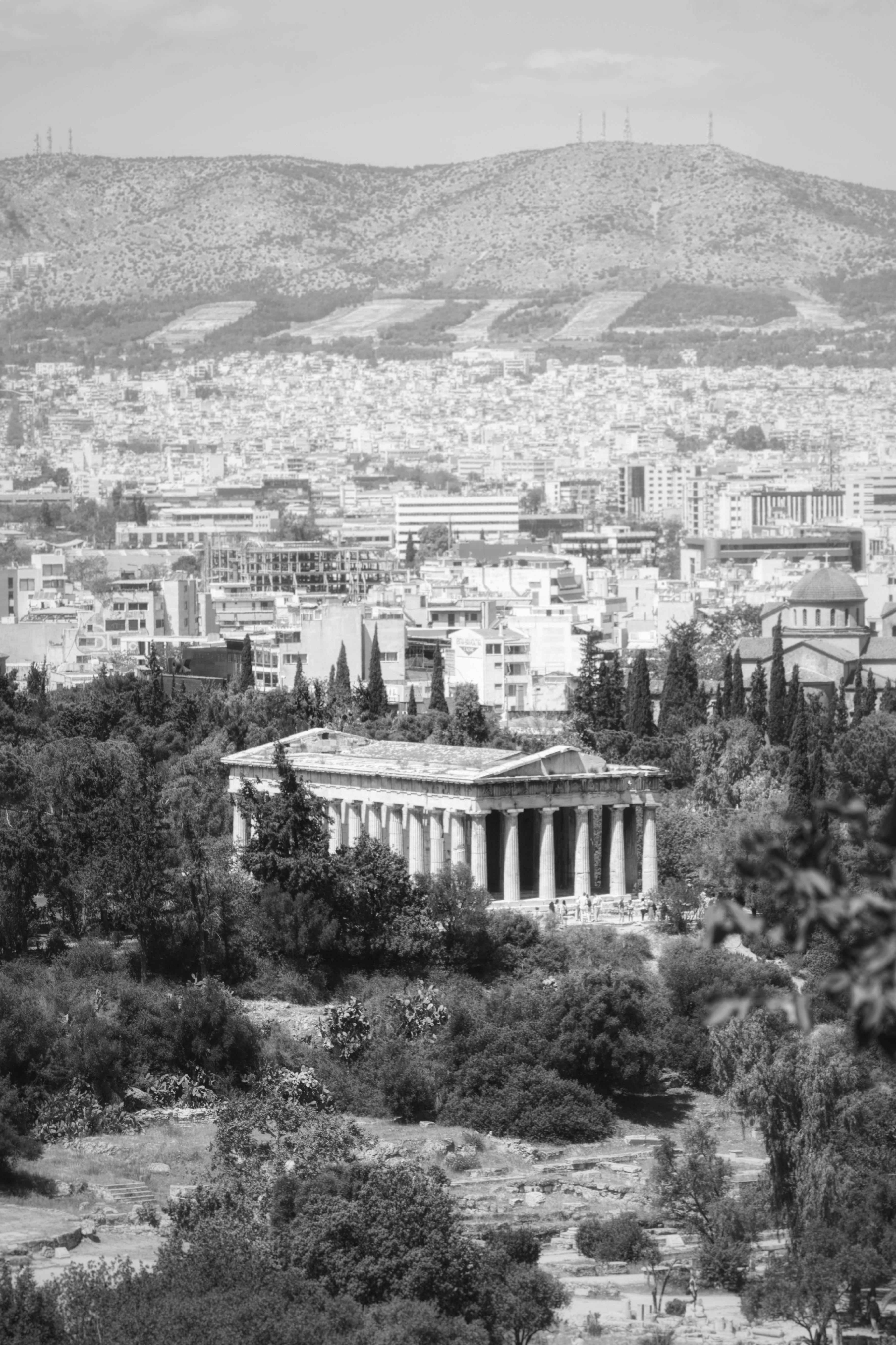 A classic black and white view of the Temple of Hephaestus in Athens, Greece.