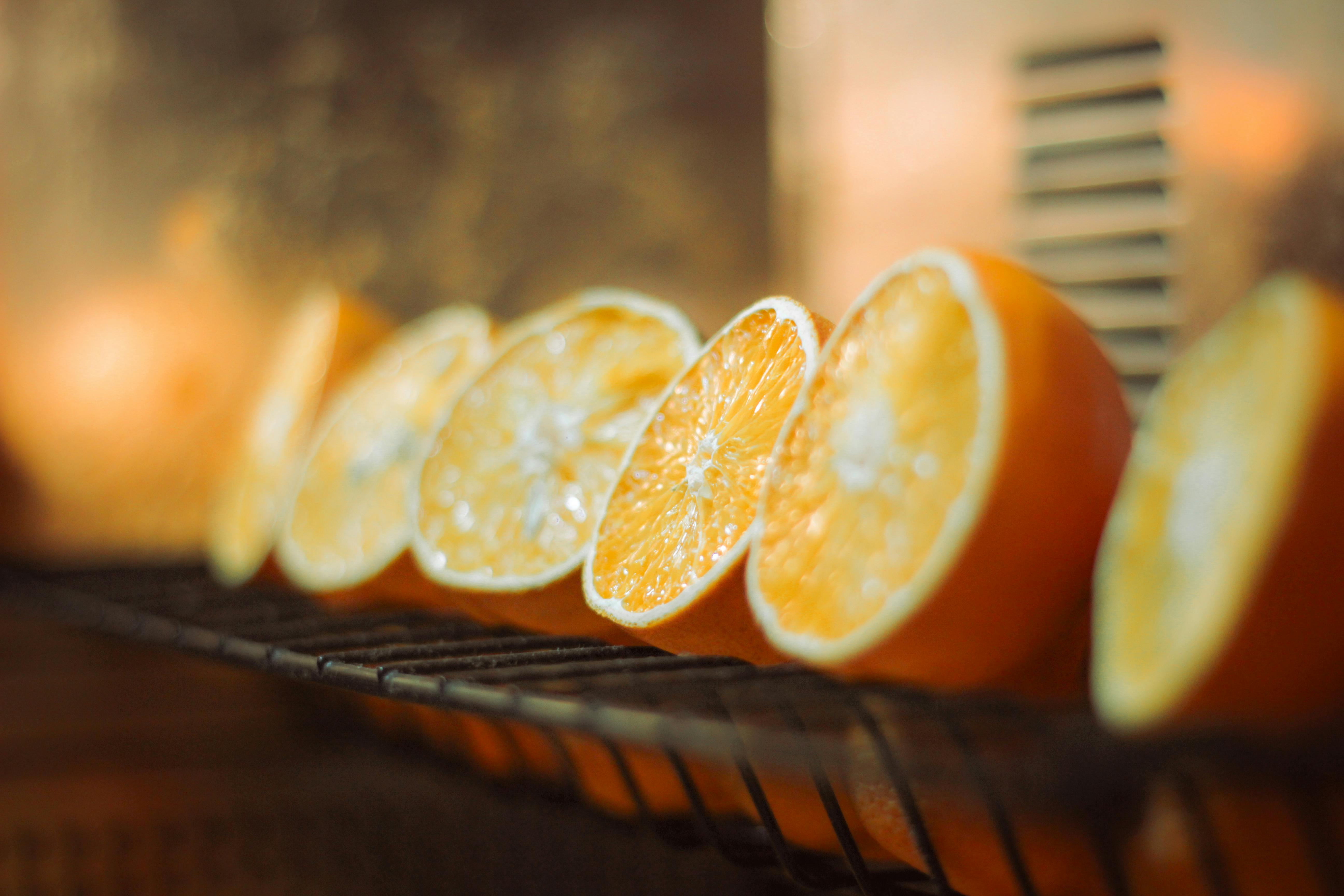 Close-up of Fresh Sliced Oranges on Rack · Free Stock Photo