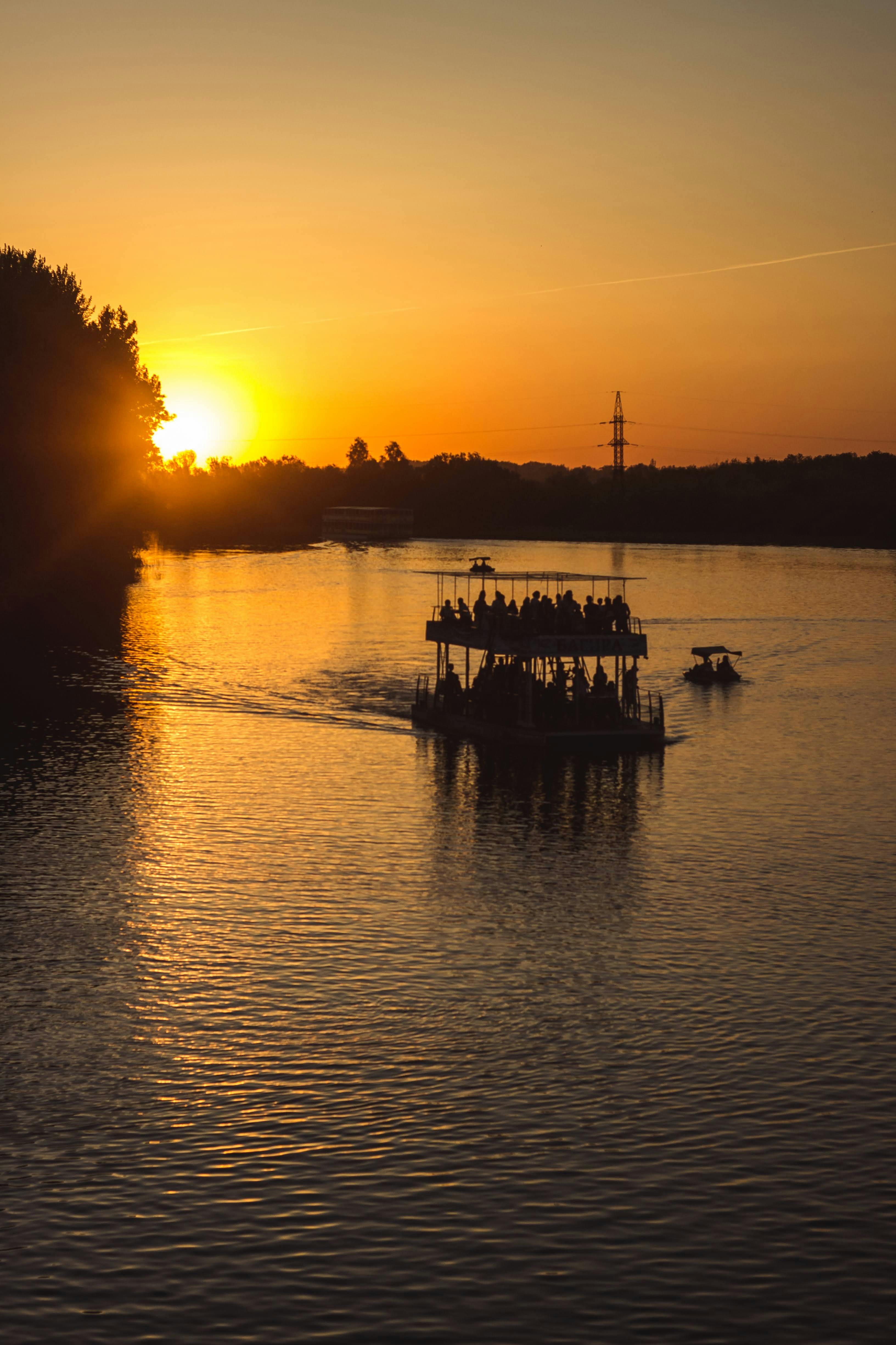 sunset boat ride on a calm river