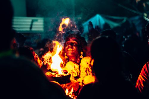 Free A colorful and emotive night scene depicting a traditional festival in Thoothukudi, Tamil Nadu, India. Stock Photo