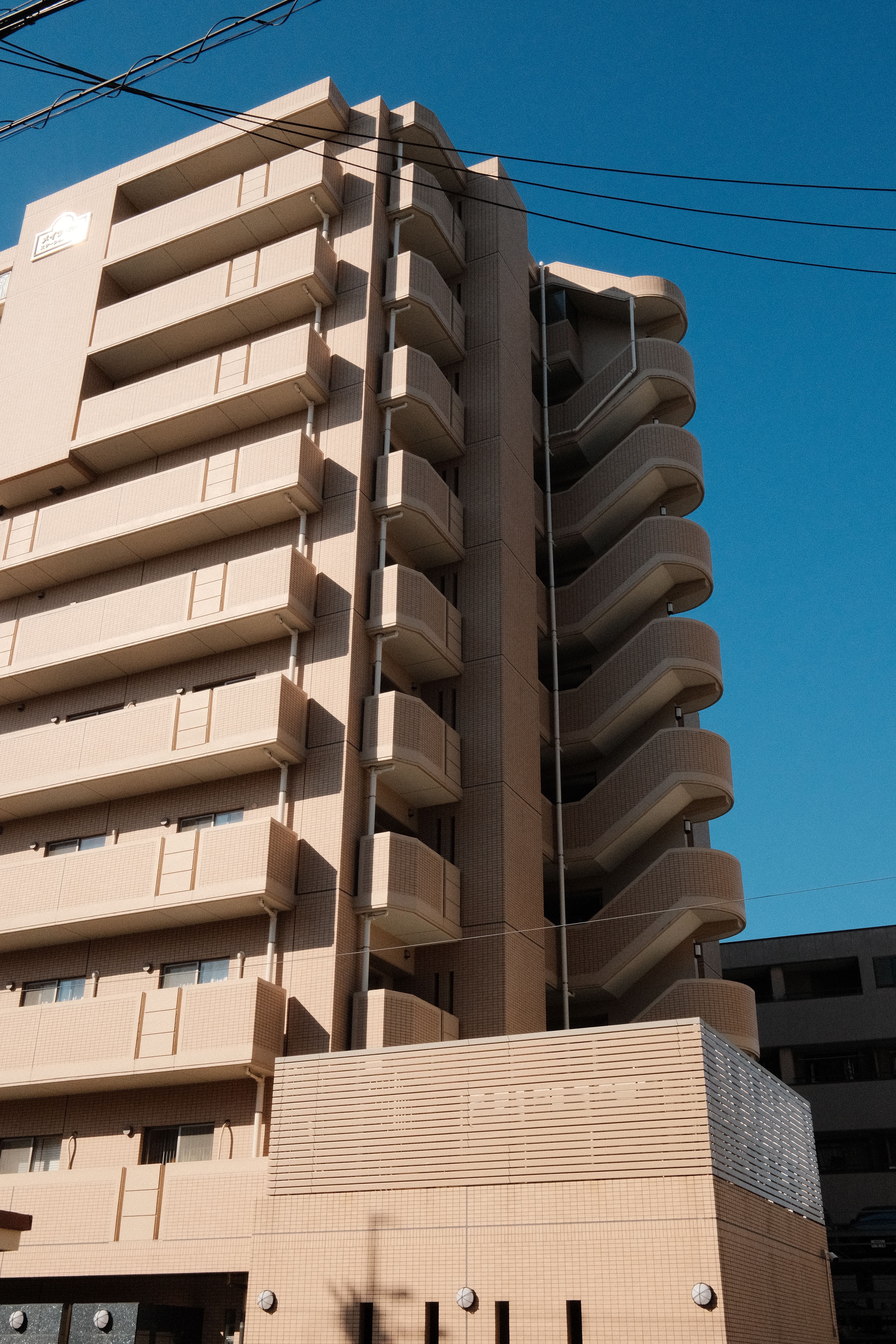 Architectural view of a modern apartment building in Inuyama, Aichi, Japan.