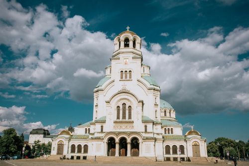 Free Stunning view of Alexander Nevsky Cathedral in Sofia, Bulgaria with a dramatic cloudy sky. Stock Photo