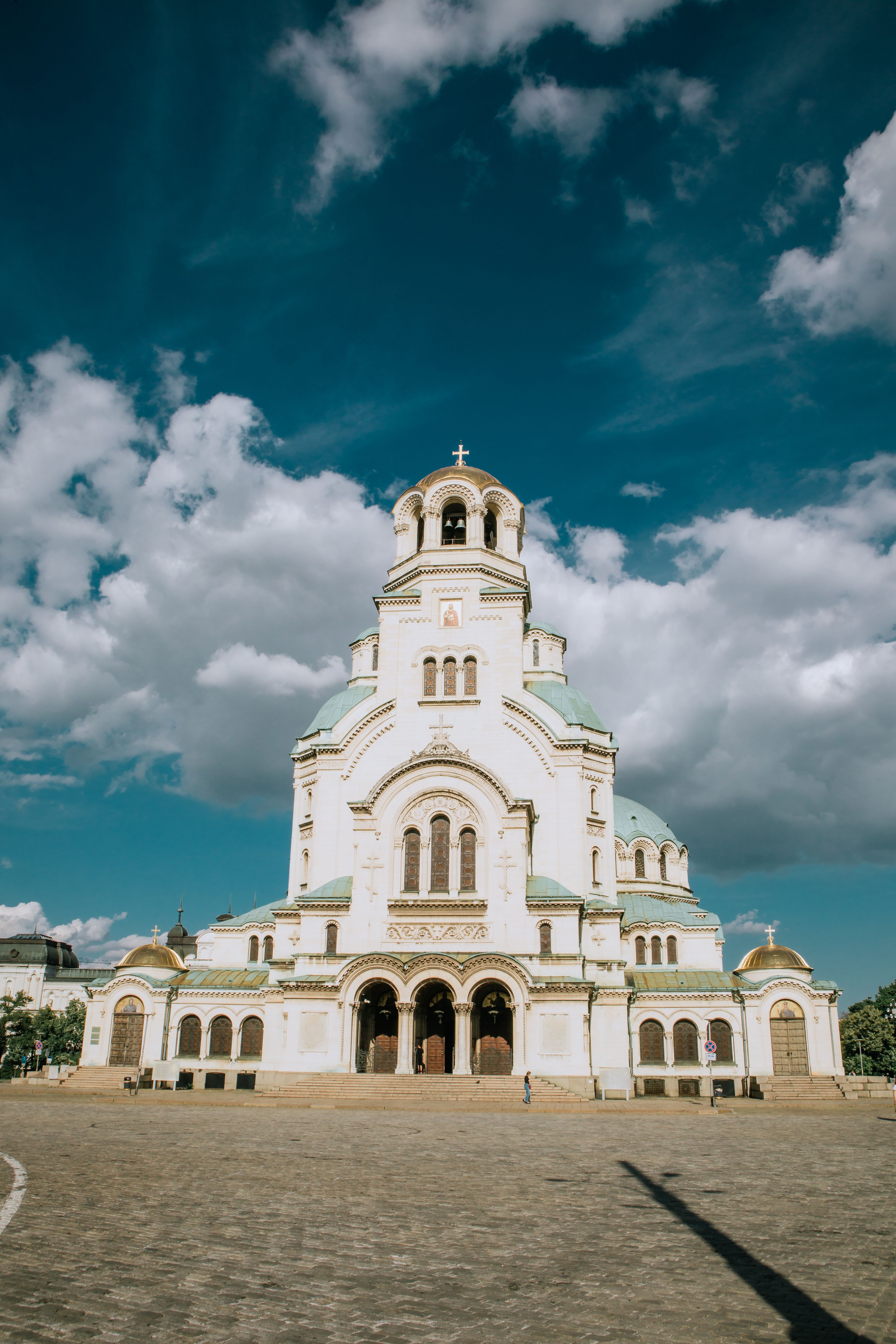 Beautiful image of Alexander Nevsky Cathedral in Sofia, Bulgaria under a clear blue sky.