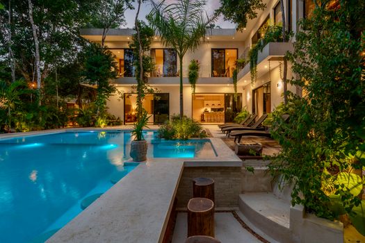 backyard pool night