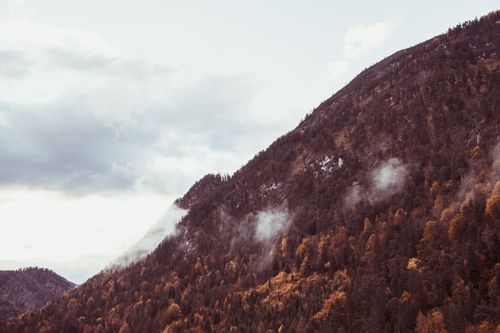 Free Stunning view of misty mountains in autumn in Tirol, Austria. Stock Photo