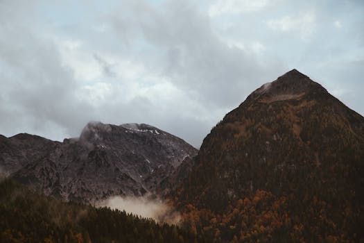 Dramatic mountain scenery with moody clouds in the Tirol region, Austria.
