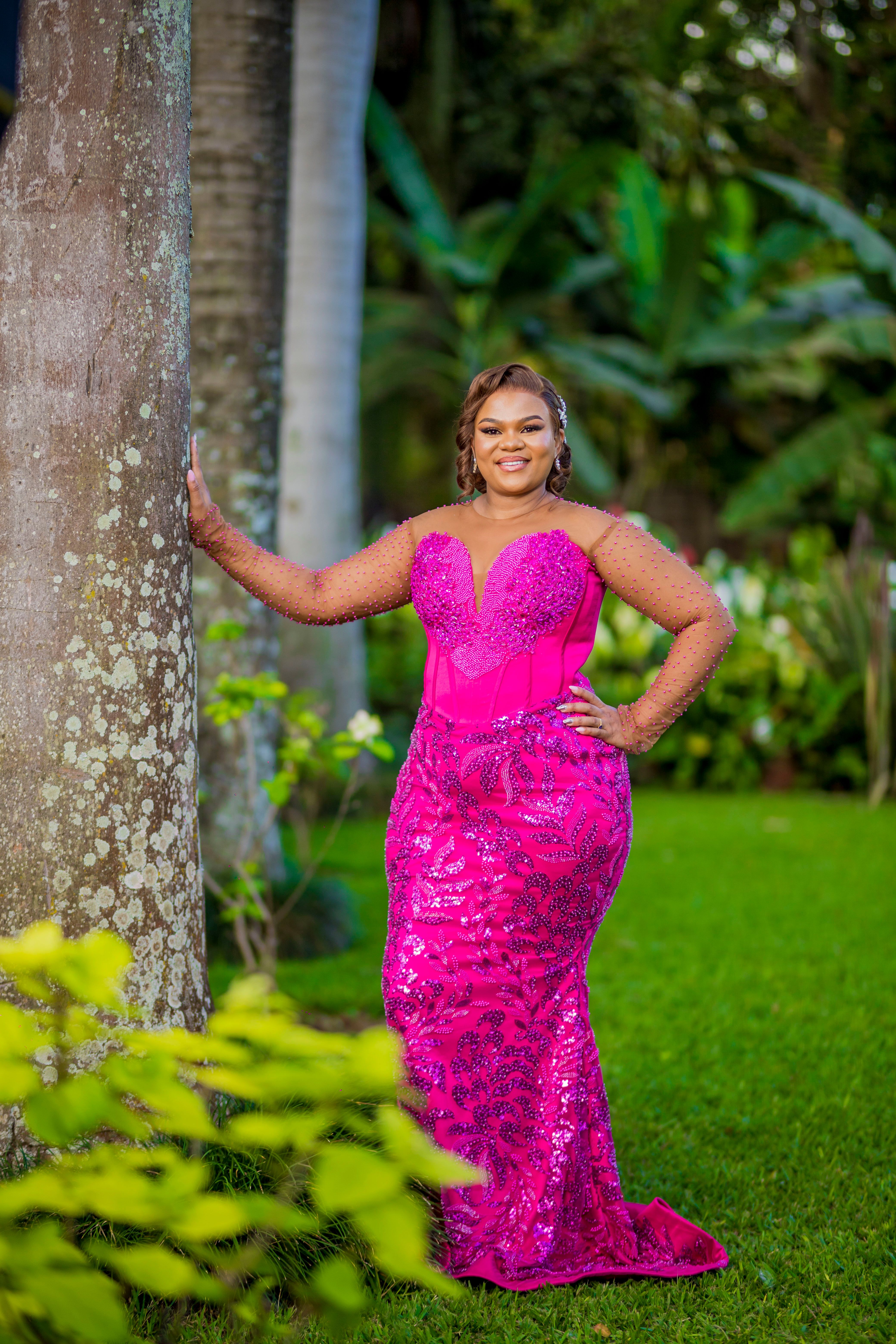 Elegant Woman in Pink Dress Outdoors · Free Stock Photo