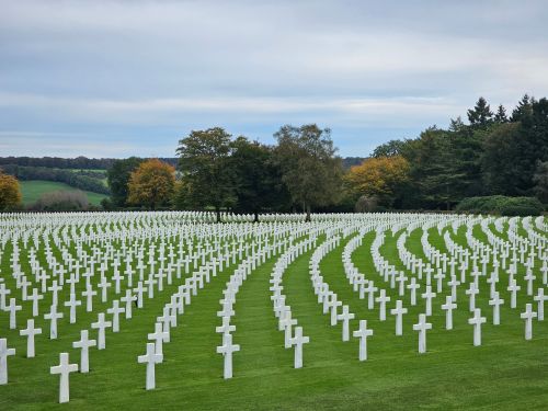 Free A peaceful cemetery with rows of white cross tombstones in Plombières, Belgium. Stock Photo