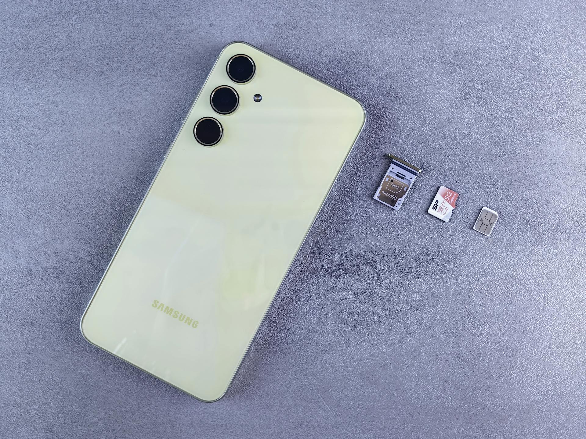 Flatlay of Smartphone with SIM and Memory Cards