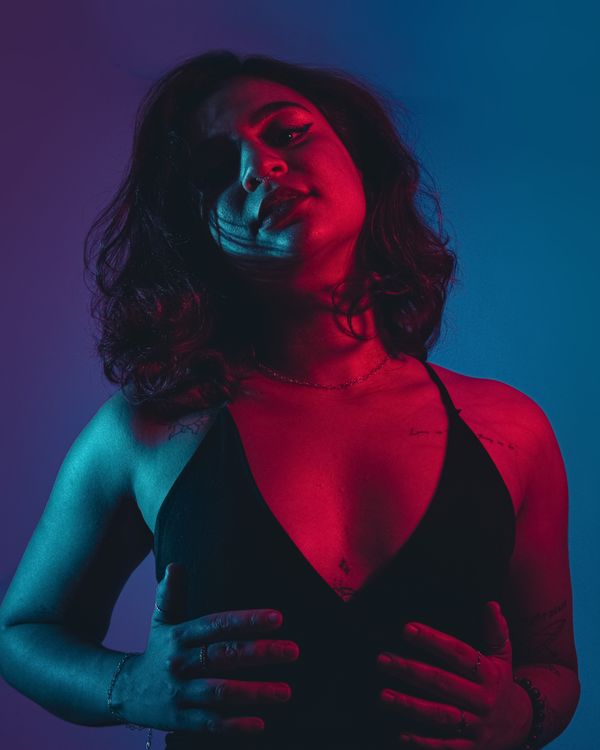 Artistic Portrait of a Woman with Dramatic Lighting · Free Stock Photo