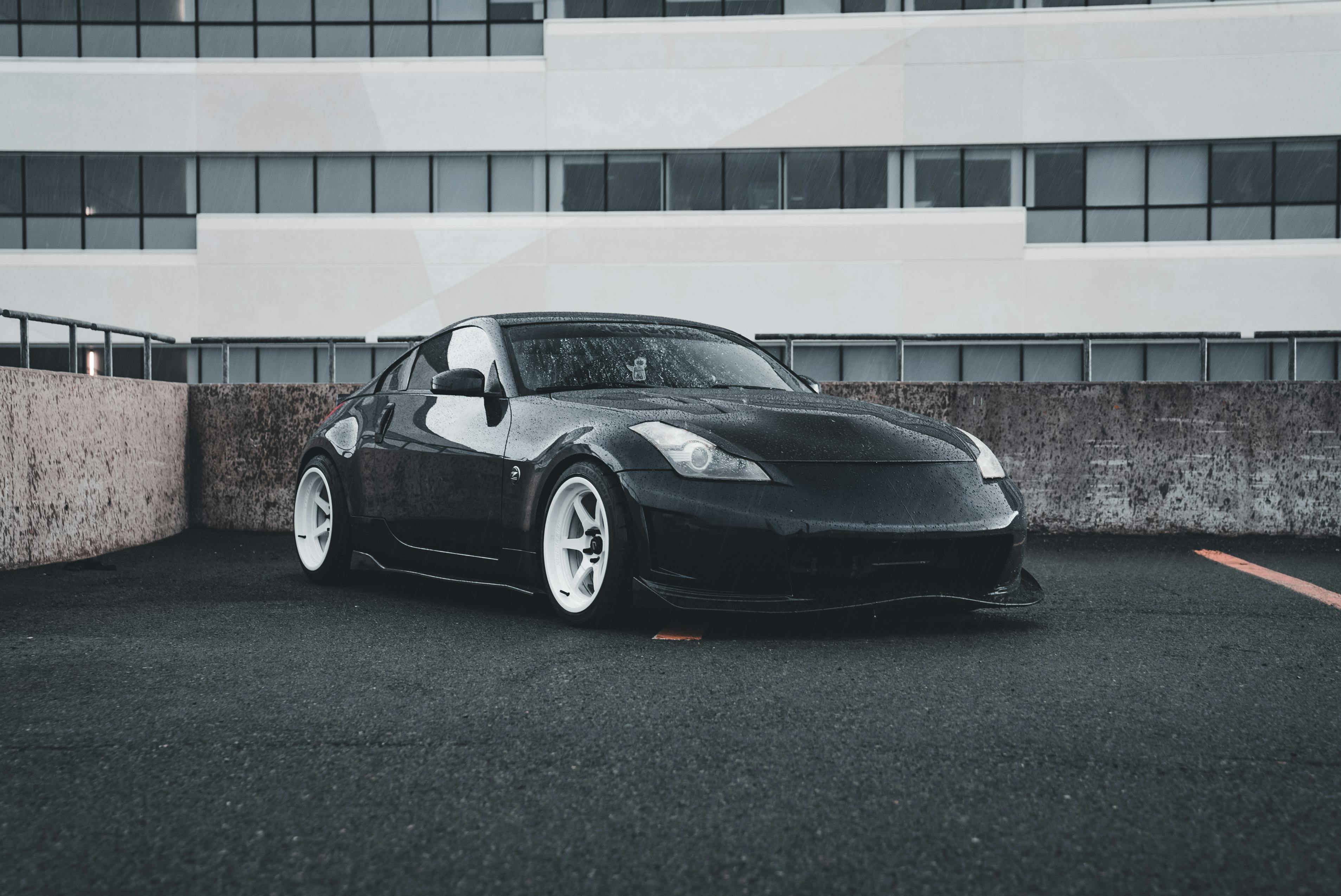 sleek black sports car in urban setting