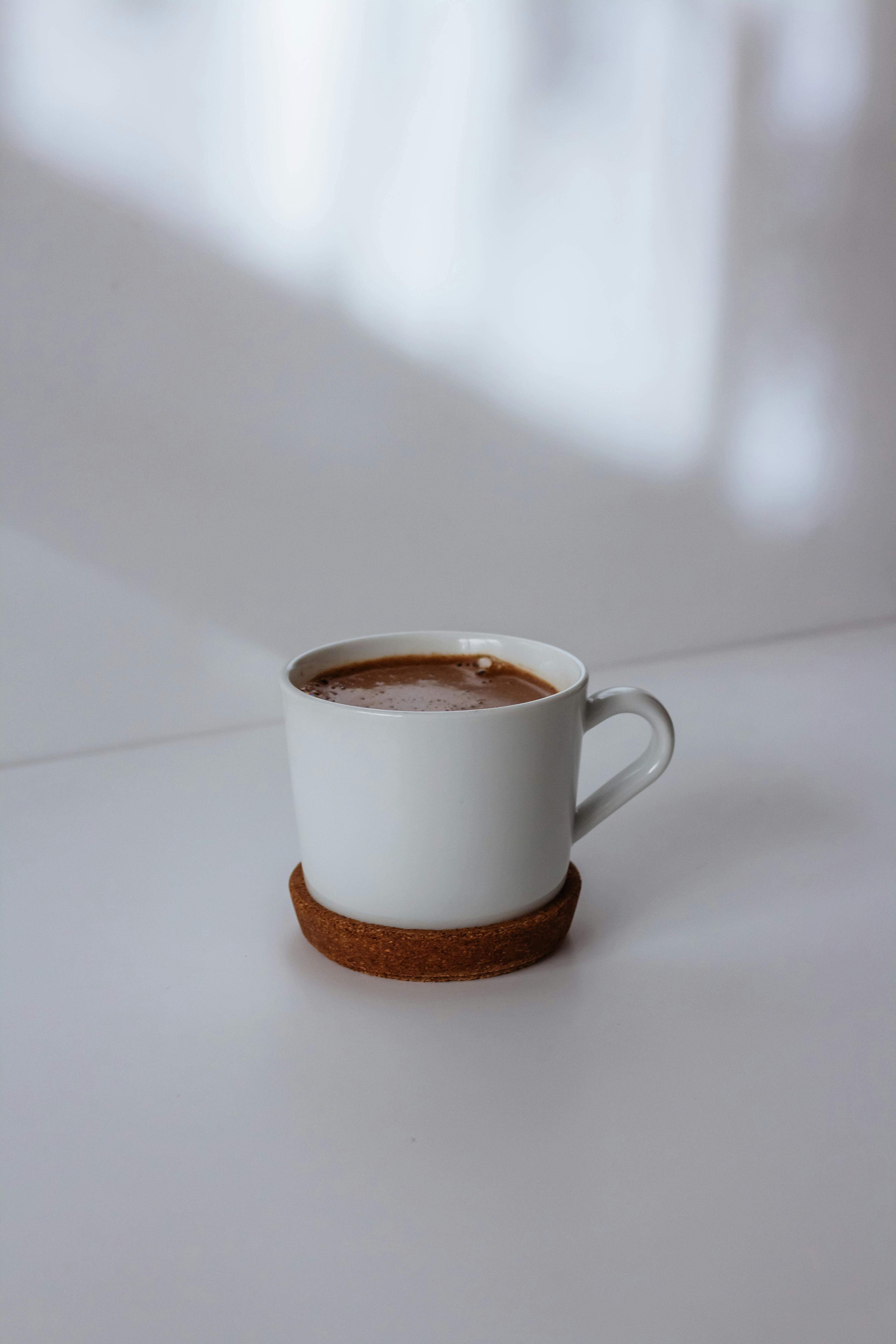 minimalist white mug with hot chocolate