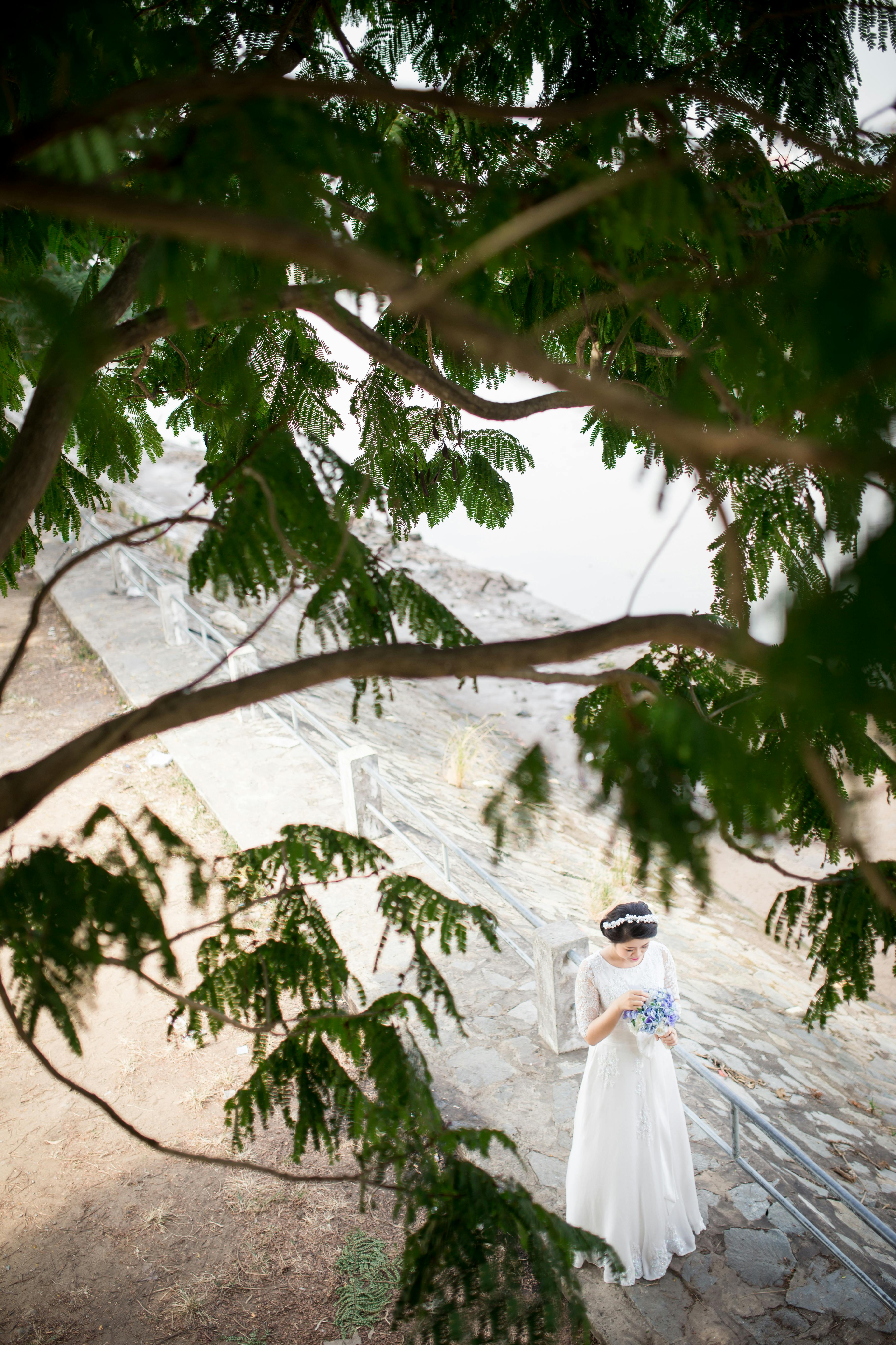 woman wearing white wedding dress