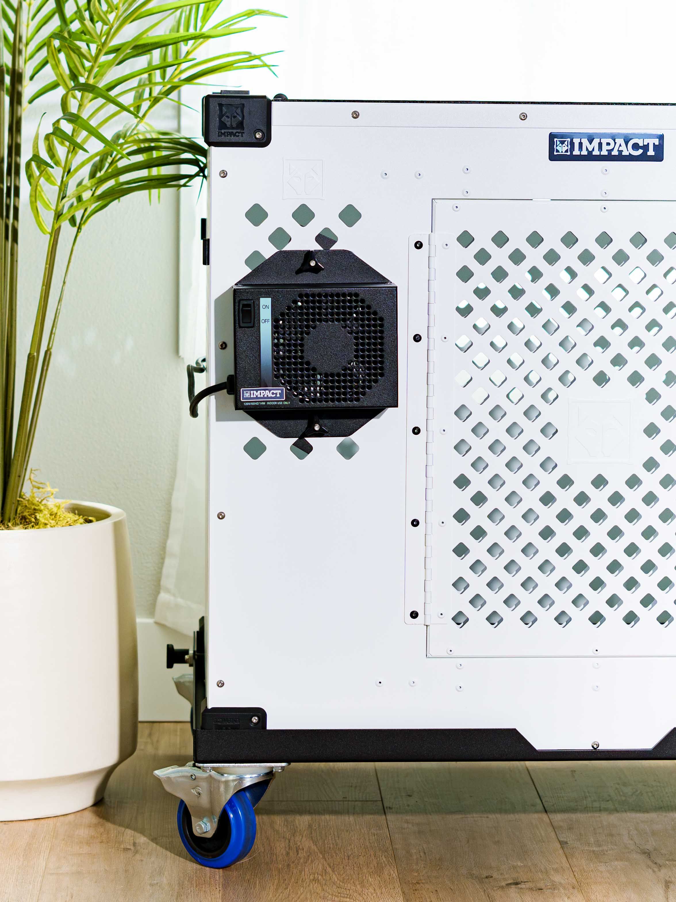 Image showcasing Modern Dog Crate with Ventilation in Cozy Home · Free Stock Photo