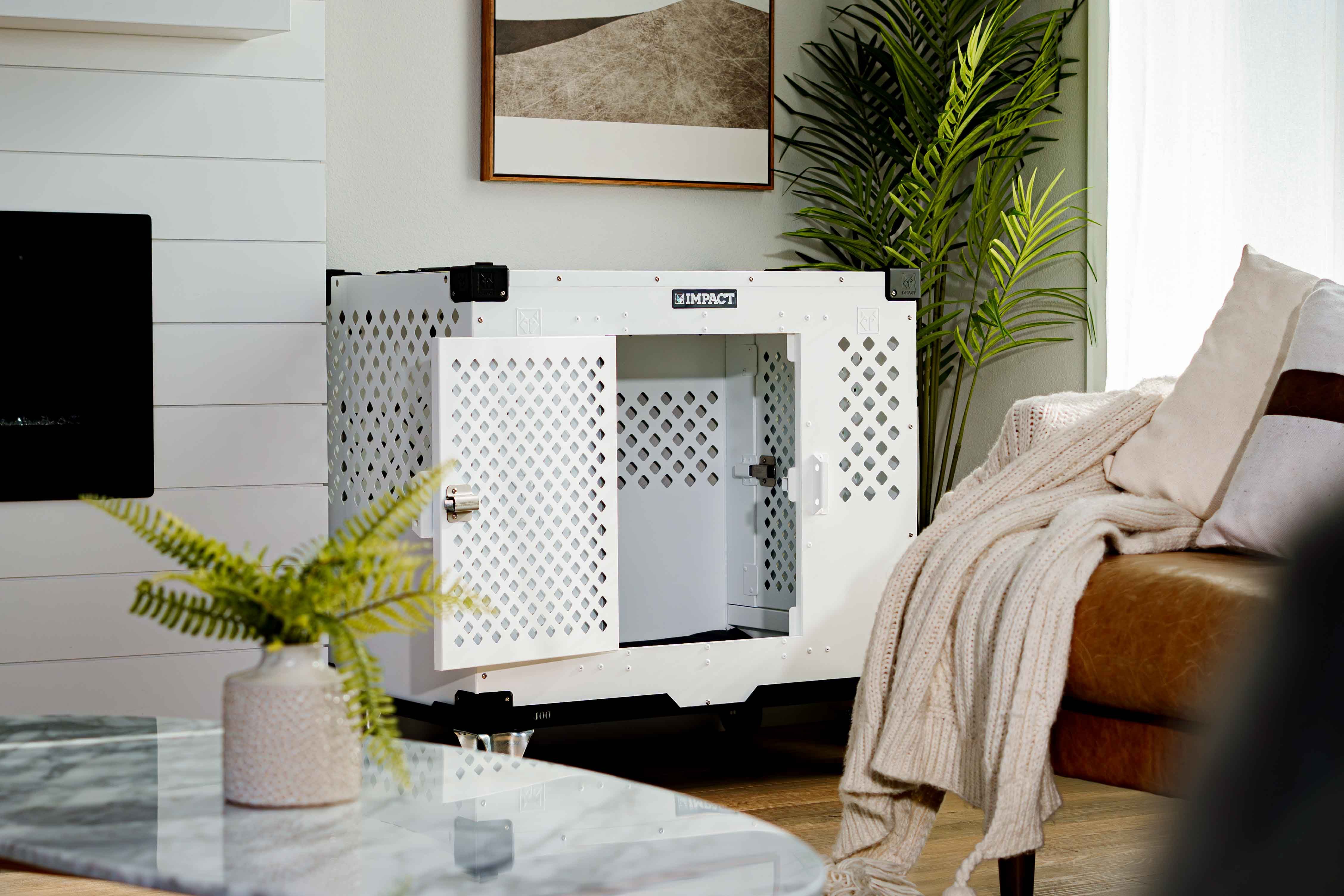 Image showcasing Modern Indoor Dog Crate in Cozy Living Room · Free Stock Photo