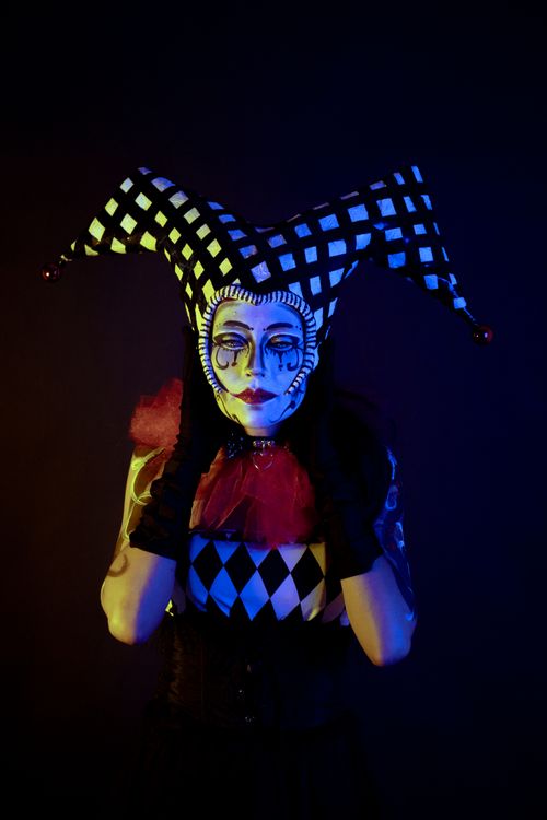 Light Jester Dramatic Jester in Artistic Costume and Makeup · Free Stock Photo