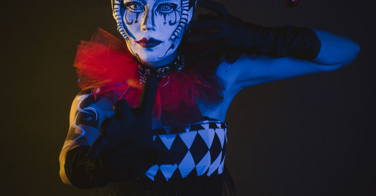 Light Jester Dramatic Jester Costume with Artistic Makeup · Free Stock Photo