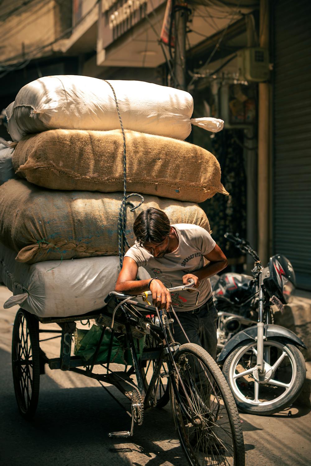 Street Vendor with Overloaded Rickshaw in India · Free Stock Photo