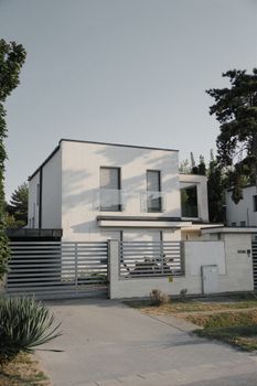 Elegant minimalist architecture of a modern home in Hungary, surrounded by nature.