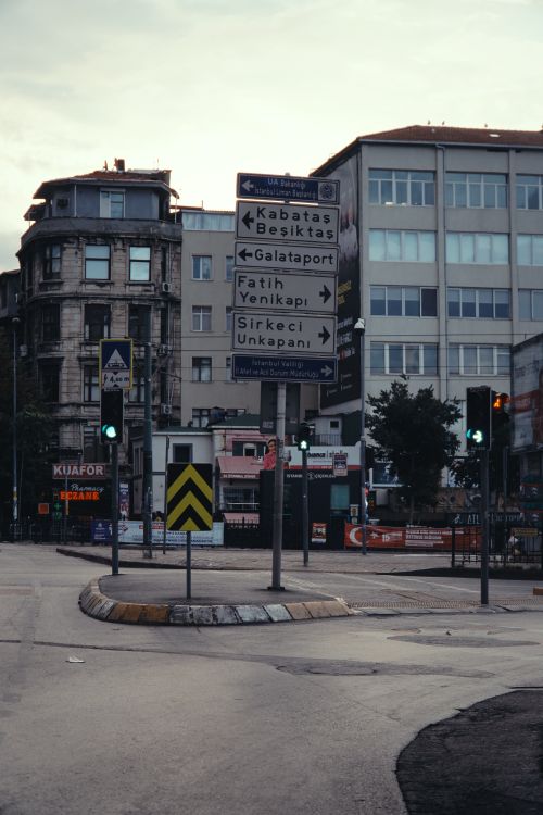 Free Downtown Istanbul intersection with historic architecture and signposts leading to famous districts. Stock Photo